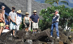 Man standing on rock pile